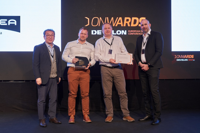 Aktuality - GARNEA získává ocenění značky Develon  na evropské konferenci prodejců
